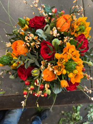 Bloemstuk oranje/rood
